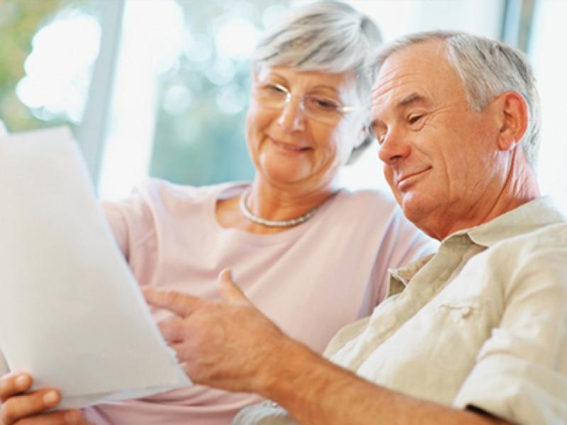 Older couple reviewing documents